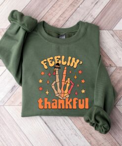 Feelin’s Thankful Skull Hand Turkey Sweatshirt Unique Thanksgiving Gift Feelin’s Thankful Skull Hand Turkey Sweatshirt Unique Thanksgiving Gift