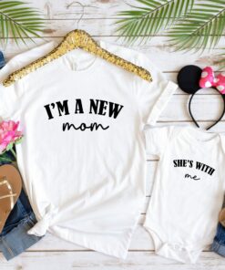 I’m A New Mom She’s With Me Shirt Funny Matching Bodysuit And Tee Our First Mother’s Day Gift For Mommy I’m A New Mom She’s With Me Shirt Funny Matching Bodysuit And Tee Our First Mother’s Day Gift For Mommy