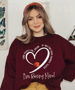 I’m Raising Mine Basketball Mom Sweatshirt I’m Raising Mine Basketball Mom Sweatshirt