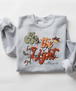 Be The Light Christmas Matthew 514 Sweatshirt