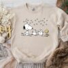 Cute Snoopy Playing With Snowman Christmas Sweatshirt Lovely Unique Xmas Gift