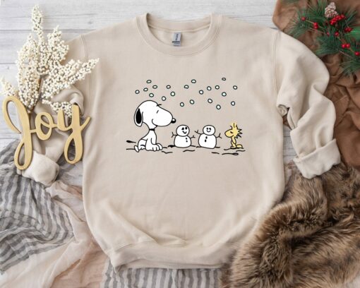 Cute Snoopy Playing With Snowman Christmas Sweatshirt Lovely Unique Xmas Gift