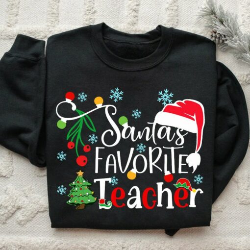 Merry Christmas Santa’s Favorite Teacher Sweatshirt Lovely Unique Xmas Gift