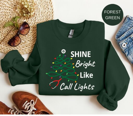 Shine Bright Like Call Lights Nurse Stethoscope Christmas Tree Lights Sweatshirt Lovely Unique Xmas Gift