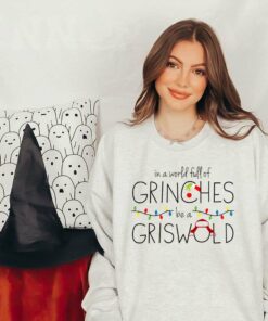 In A World Full Of Grinches Be A Griswold Christmas Sweatshirt
