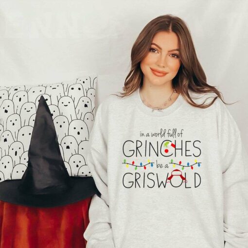 In A World Full Of Grinches Be A Griswold Christmas Sweatshirt