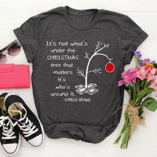 It’s Not What’s Under The Christmas Tree That Matters Charlie Brown T-Shirt