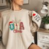 Personalized Oma Claus Christmas Grandma Unique Gift For Mom Custom Mama Sweatshirt With Children Name On Sleeve