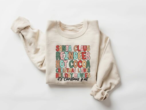 Santa Claus Reindeer Hot Cocoa Christmas Lights Holiday Movies Its Christmas Y’all Sweatshirt Cute Unique Xmas Gift