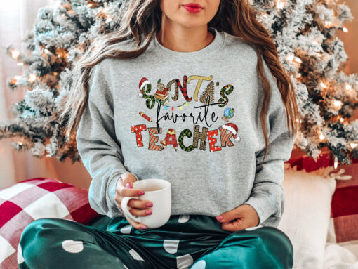 Santa’s Favorite Teacher Funny Christmas Sweatshirt Unique Xmas Gift