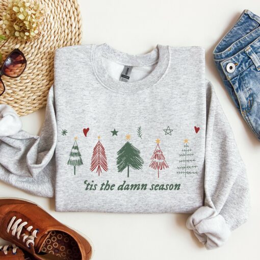 Tis Damn Season Christmas Eras Trees Hearts Stars Swiftie Sweatshirt Lovely Unique Xmas Gift