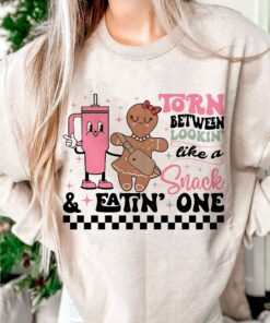 Torn Between Lookin’ Like A Snack &amp Eating One Gingerbread Cookie Christmas Sweatshirt Pinky Lovely Unique Xmas Gift