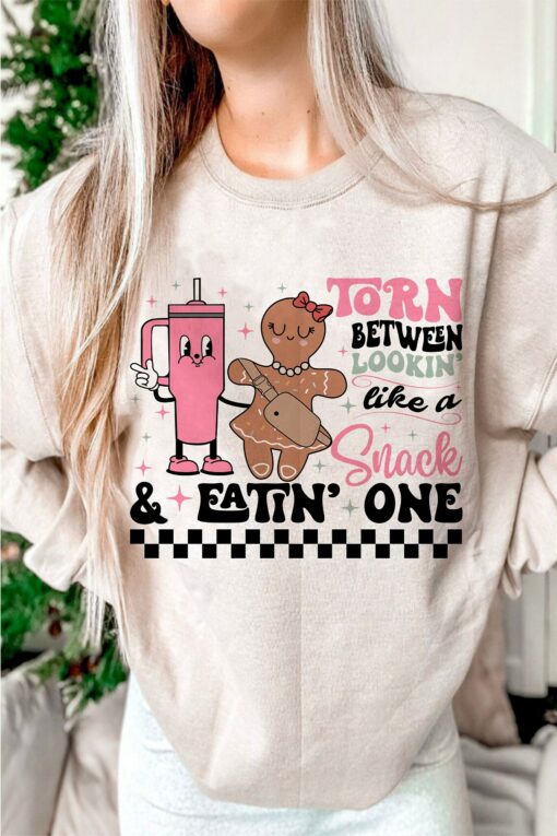 Torn Between Lookin’ Like A Snack &amp Eating One Gingerbread Cookie Christmas Sweatshirt Pinky Lovely Unique Xmas Gift