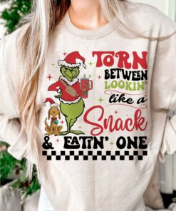 Torn Between Lookin’ Like A Snack &amp Eating One Grinchmas &amp Dog Christmas Sweatshirt Pinky Lovely Unique Xmas Gift