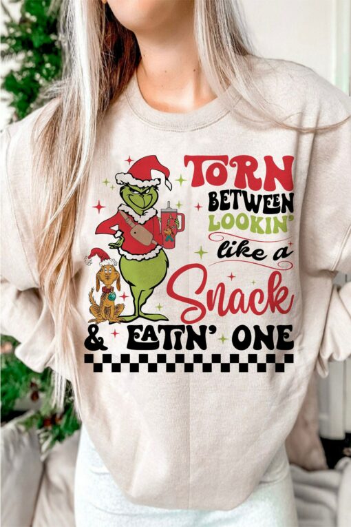 Torn Between Lookin’ Like A Snack &amp Eating One Grinchmas &amp Dog Christmas Sweatshirt Pinky Lovely Unique Xmas Gift